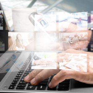technology, internet, tv and news concept - man hands with virtual screens